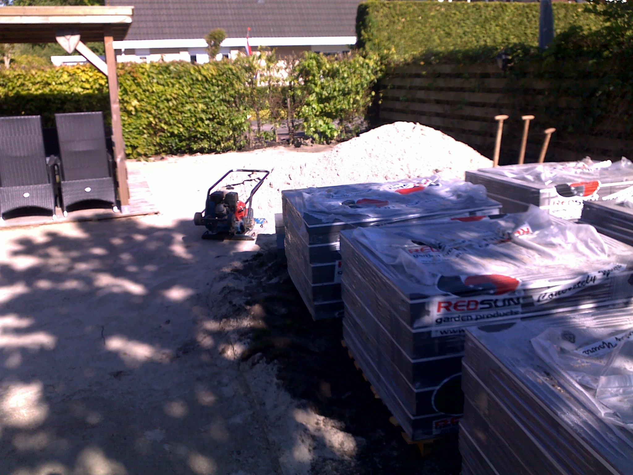 bestraten van het tuinterras